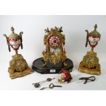 A 19th century French gilt brass mantel clock garniture with painted porcelain dial, white metal