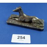 A silver plated model of a greyhound