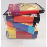 Four Harry Potter first edition books