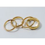 Four 22ct gold wedding bands, 16g