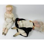 A Victorian composite doll with fabric body and a Victorian wax doll (head a/f) with fabric and