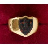 An 18 carat gold seal ring set blood stone shield, total weight 10.5g