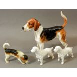 A Royal Doulton fox hound and three other dogs