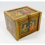 An Indian painted wooden box with figures to top and sides, the drop front enclosing drawers, 18cm