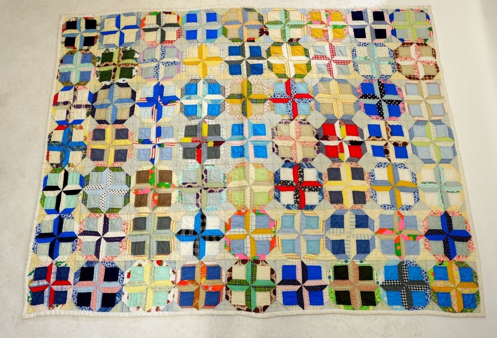 A pair of single patchwork quilts with hexagon and square design, 156cm x 2m and 160cm x 2.4m