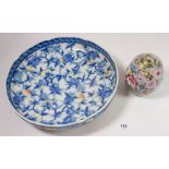 A small Chinese Canton floral vase and cover and a large circular serving bowl printed fruit, 26cm