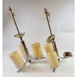 A pair of Art Deco style chrome stepped three branch light fittings with five glass shades