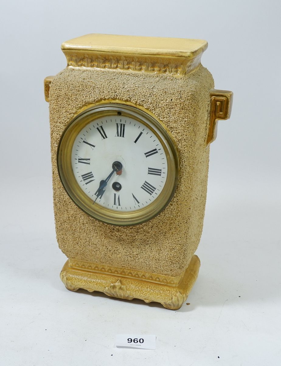 A pottery mantel clock, 26cm