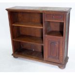 An oak bookcase with drawer and cupboard, 110cm wide