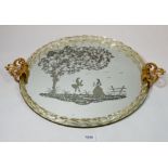 A vintage Italian glass circular tray with engraved decoration and gilt metal handles, 42cm diameter