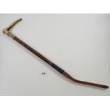 A Swaine & Adeney horn handled riding crop with silver plated collar