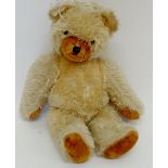 A vintage gold plush teddy bear, 48cm