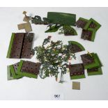 A Britains painted lead garden set including sundial and crazy paving