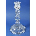 A moulded glass candlestick marked Baccarat 25cm tall