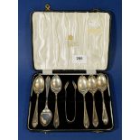 A set of silver teaspoons and sugar nips, Sheffield 1957