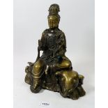 A Chinese bronze figure of Puxiang seated on an elephant, 28cm - six character mark to base