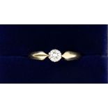 A 14 carat gold solitaire diamond ring, size M to N, 2.4g
