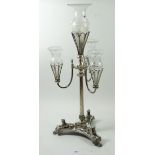 A silver plated epergne with cast sphinx to triple base and fitted four etched glass flutes