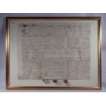 An 18th century indenture with three wax seals, framed and glazed, 59 x 78cm