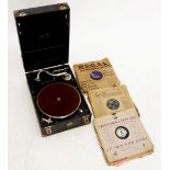 A portable gramophone and 78 rpm records