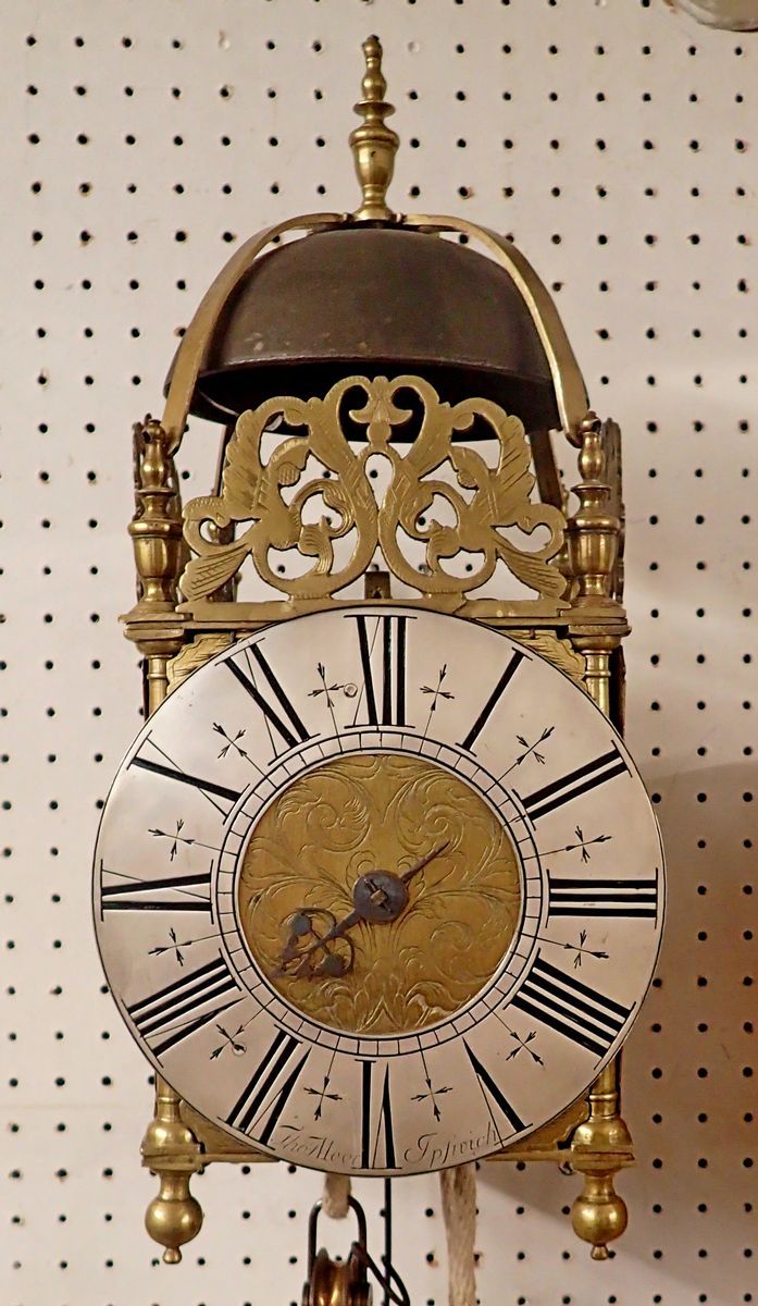 A 20th century Thomas Moore of Ipswich 'hook & spike' brass lantern style clock