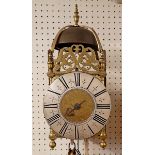 A 20th century Thomas Moore of Ipswich 'hook & spike' brass lantern style clock