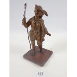 A French gilt spelter figure of man holding a long whip, 18cm