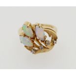 A 14k gold vintage style spray ring set three opals and four small diamonds, 5g, size L