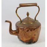 A Victorian copper kettle