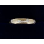 An 18 carat gold eternity ring inset diamonds, 45g, size K