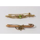 An Edwardian bar brooch set peridot and seed pearls and a 9ct gold seed pearl bar brooch