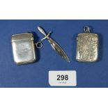 Two silver vesta cases Birmingham 1886 and 1912, and a dagger form bookmark Birmingham 1922, 40g
