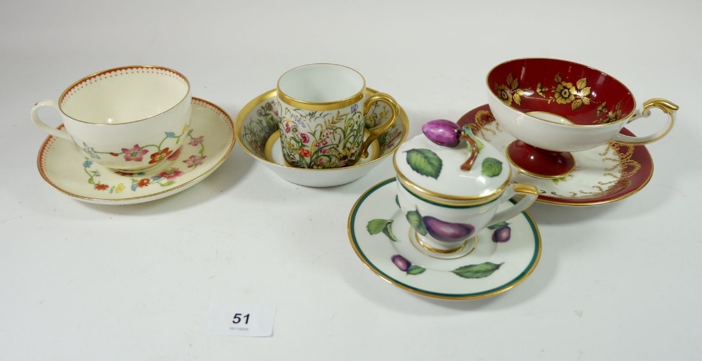 A Limoge Royale Fleurs des Champs floral cup and saucer with an Ugo Poggi Medici lidded cup and