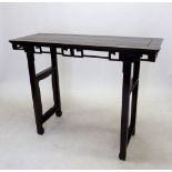 A Chinese hardwood tall altar table with pierced and carved frieze, circa 1900, 133 x 46 x 101cm