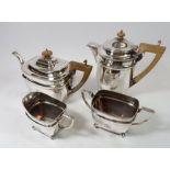 An Edwardian silver plated four piece tea service