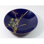 A large blue Japanese 20th century dish painted flowers, 28cm