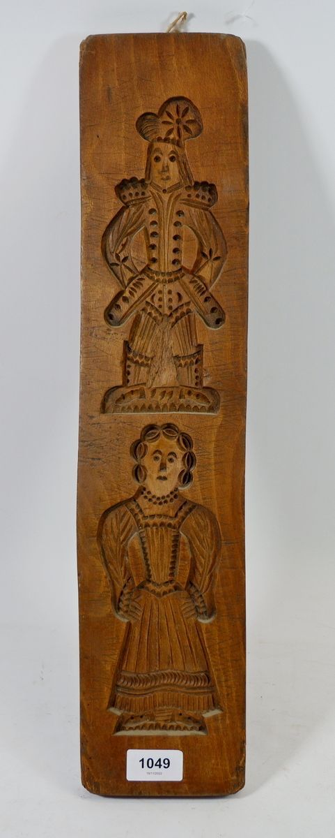 An early 19th century gingerbread mould, 52cm