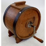 An Edwardian iron bound butter churn with handle