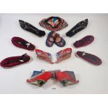 A group of embroidered Chinese and Japanese shoes and slippers
