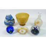 A group of coloured glass including a scent bottle, paperweight etc
