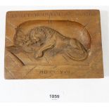 A carved wooden panel of a lion of Lucerne, 15 x 20cm