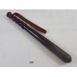 A turned wood policeman's truncheon