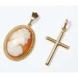 An 18 carat gold crucifix and a 9 carat gold framed cameo pendant