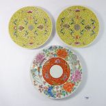 A Japanese floral painted plate with six character mark, 23cm diameter and two yellow vintage