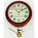 A Victorian mahogany circular wall clock by Whitehead of Market Harborough