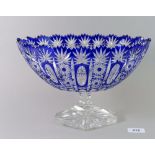 A blue flashed and cut glass pedestal fruit bowl, 20cm high