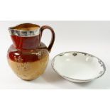 A silver mounted Doulton Stoneware jug (repaired) and a silver mounted bowl