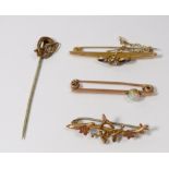 A gold bar brooch set opal (unmarked) 2.2g, two Edwardian 9ct gold bar brooches and a stick pin, 4g