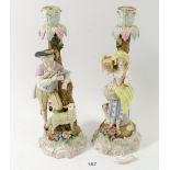 A pair of Meissen style candlestick figures of Galant and Companion a/f with faux A R marks, 26cm H