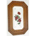 An oak framed vintage mirror, painted with roses, 82 x 52cm